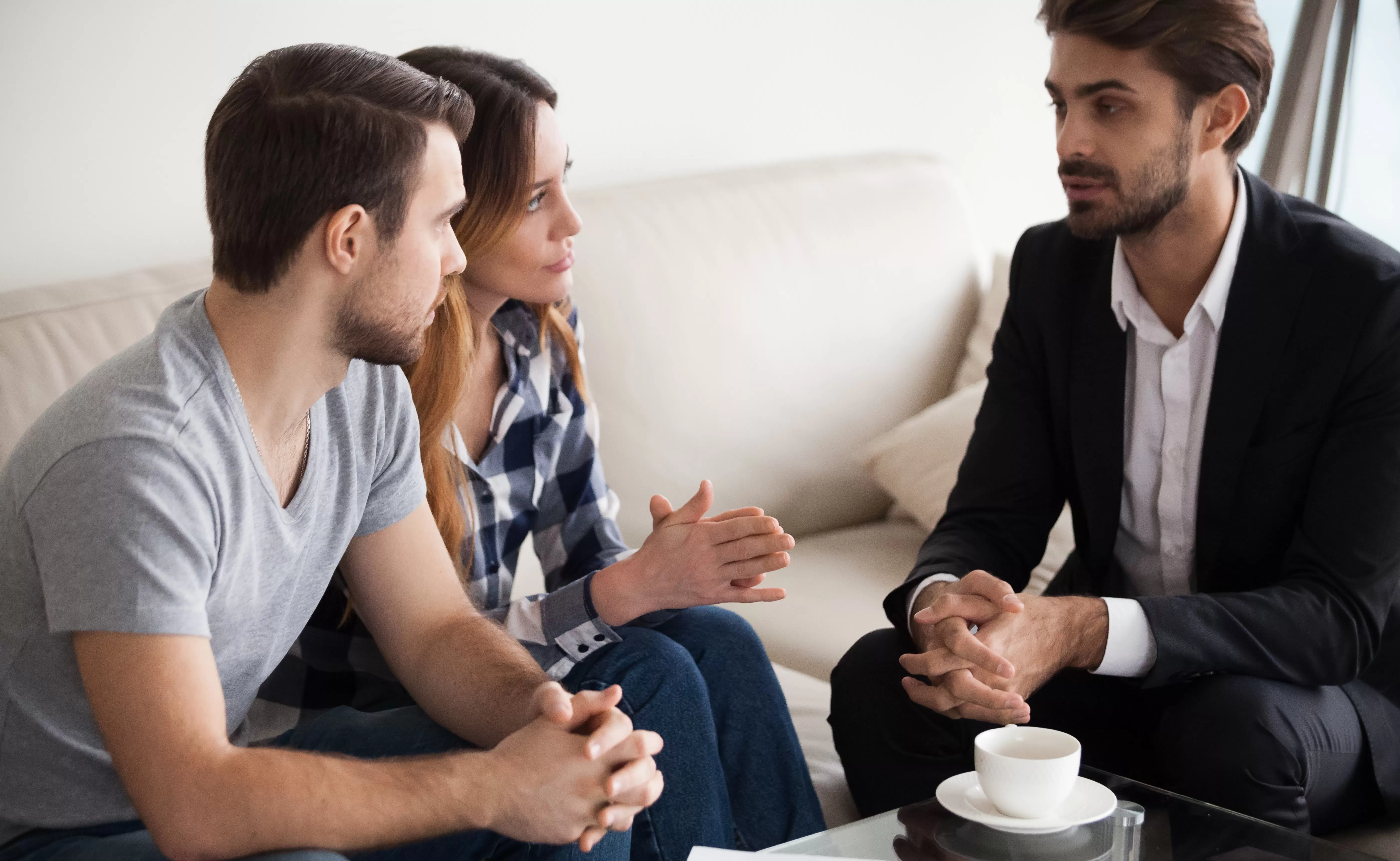 Young couple discussing mortgage options with SCU Mortgage Loan Officer